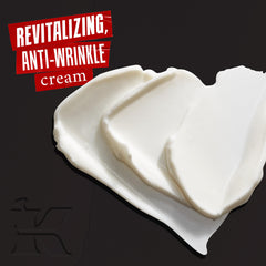 Kiehl's Age Defender cream texture closeup shows smooth application