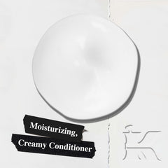 Kiehl's Amino Acid Conditioner close-up shows creamy texture for smooth detangling.