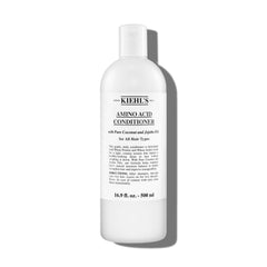 Kiehl's Amino Acid Conditioner bottle closeup shows creamy formula for smoother hair.