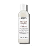 Kiehl's Amino Acid Shampoo bottle front promoting gentle cleansing.