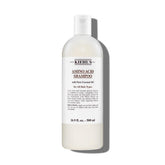 Kiehl's Amino Acid Shampoo bottle pour for daily cleansing and nourishment.