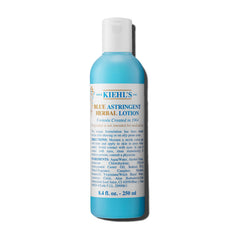 Kiehl's Blue Astringent Herbal Lotion bottle on shelf balances oil and refreshes skin