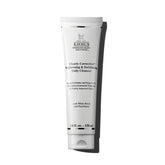 Kiehl's Clearly Corrective cleanser bottle highlights brightening and exfoliating benefits.