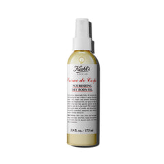 Kiehl's Creme de Corps dry oil spray bottle delivers quick hydration for soft, smooth skin.