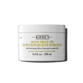 Kiehl's Olive Fruit Oil Deeply Reparative Hair Mask bottle closeup promotes moisture for dry hair.