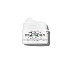 Kiehl's Ultra Facial Cream jar closeup showing creamy texture and hydration.