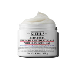 Kiehl's Ultra Facial Overnight Mask jar closeup showing creamy texture for deep hydration.