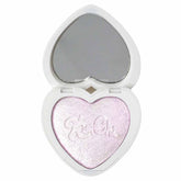 KimChi Chic Pearl Gone Wild Highlighter compact with mirror for on-the-go touch-ups.