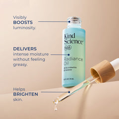 Kind Science Radiance Oil dropper releases a few drops for easy nightly skincare.