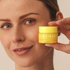 Brightwave cream swirl on Kinship skin illustrates smoothing hydration for under-eye area.