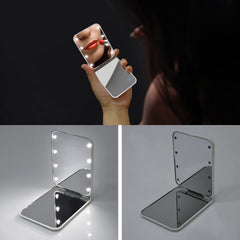 Kintion compact travel-size pocket mirror ready for on-the-go touchups.