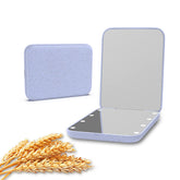 Kintion Wheat Straw Pocket Mirror, closed with magnetic switch for easy portability.