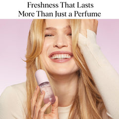 Kitsch Sheer Violet spray on hair mid-length for instant refresh.