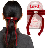 Kitsch velvet bow clip gemstone closeup, showcasing festive sparkle.