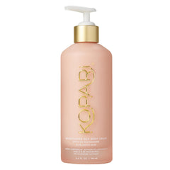 Kopari Brightening Silk Body Cream bottle with niacinamide for radiant, even skin tone.