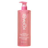 Kopari Jumbo Coconut Hydrating Body Wash bottle on shelf promising luxurious hydration.