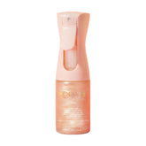 Kopari Rose Gold Sunglaze Sunscreen bottle with SPF 42 for daily sun protection.