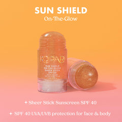 Kopari Sun Shield On-The-Glow stick applied to arms for broad protection