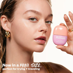Kosas DreamBeam application closeup showing lightweight SPF40 for smooth makeup base