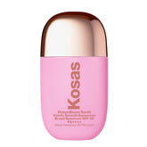 Kosas DreamBeam bottle closeup highlights lightweight sunscreen for makeup prep.