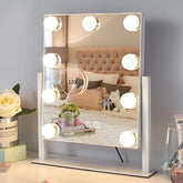 Kotdning vanity mirror with nine dimmable bulbs for even makeup lighting.