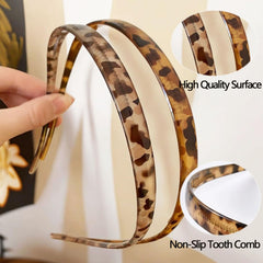 KOVOLITU leopard headband worn with glasses demonstrates curved design avoids frame contact.