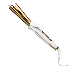 Kristin Ess 1-inch titanium curling iron barrel gliding through hair for polished beach waves