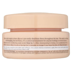 Kristin Ess hair mask application from middle to ends shows easy detangling and slip.