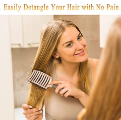 KTKUDY detangling brush in action on wet hair for gentle brushing.