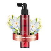 KUNDAL caffeine hair tonic bottle close-up for targeted scalp care