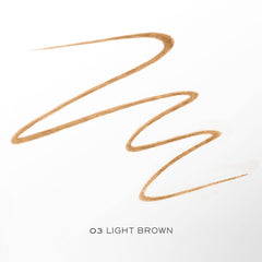 Lancôme Brow Shaping Powdery Eyebrow Pencil in use close-up with spoolie for shaping and grooming brows.