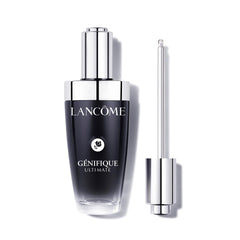 Lancôme Génifique Ultimate Dual Recovery Serum bottle shown on a clean surface for vibrant skin renewal.