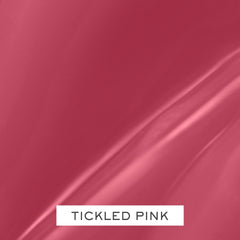 Lancôme Juicy Tubes ultra-shine application swatch on lips, highlighting color payoff.