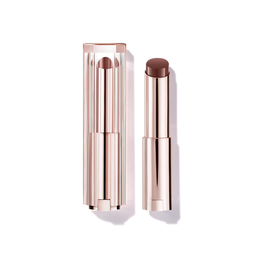 Lancôme Lip Idôle Butterglow balm packaging showcases premium branding for elegant lip care.
