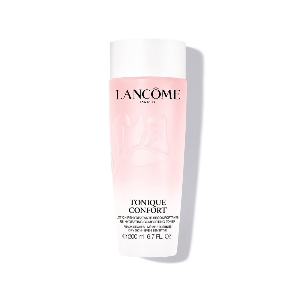 Lancôme Tonique Confort bottle close-up shows hydrating milky texture for daily comfort.