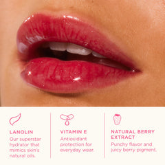 Lanolips Glossybalm Berry swirl gloss with light shimmer in hand.