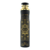 Lattafa Badee Al Oud Oud For Glory air freshener bottle close-up highlights citrus-oud aroma for a fresh ambiance