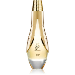 Lattafa Pride Gharam bottle-pour close-up, long-lasting scent for evening wear.