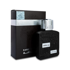 Lattafa Ramz Silver bottle front emphasizes versatile amber vanilla scent for both men and women.