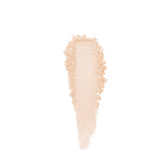 Laura Mercier Light Catcher powder with brush focus for seamless setting and glow.