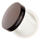 Laura Mercier Secret Brightening under-eye powder jar close-up showing airy texture for smoothing concealer