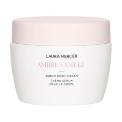 Laura Mercier Serum Body Cream bottle close-up showing Ambre Vanille fragrance for daily nourishment.