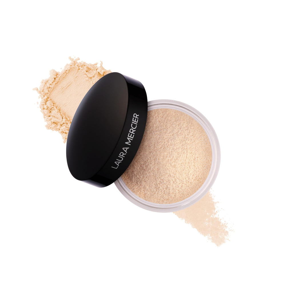 Laura Mercier translucent loose powder jar closeup for long-lasting shine control in daily makeup.