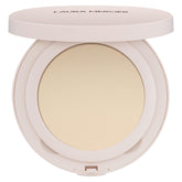 Laura Mercier Ultra-Blur Powder Compact delivers pore-blurring translucent finish for long-lasting wear.