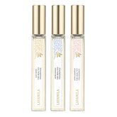 Lavanila Vanilla Coconut roller perfume in application on skin for tropical warmth.