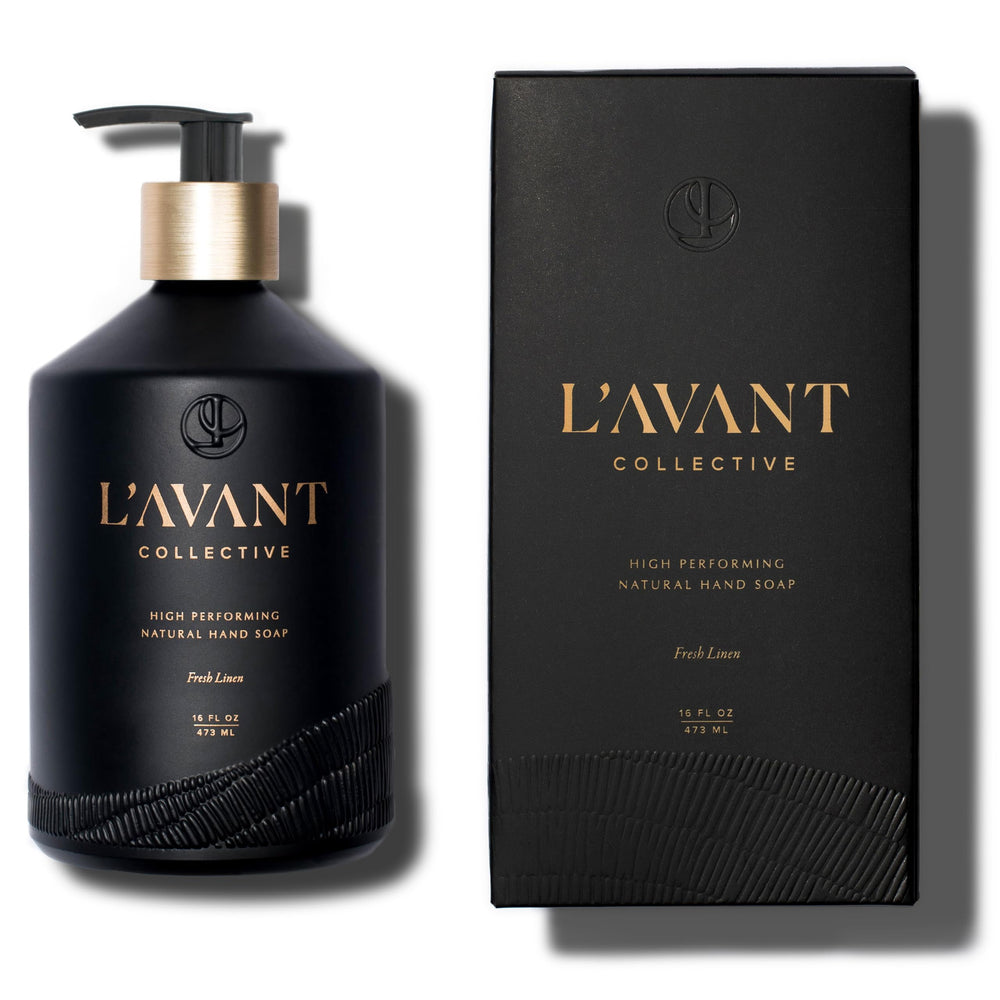 L'AVANT Collective hand soap bottle on sink highlighting reusable glass packaging for eco-conscious kitchens.