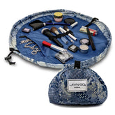 Lay-n-Go Cosmo bag open showing interior with makeup laid flat for quick access