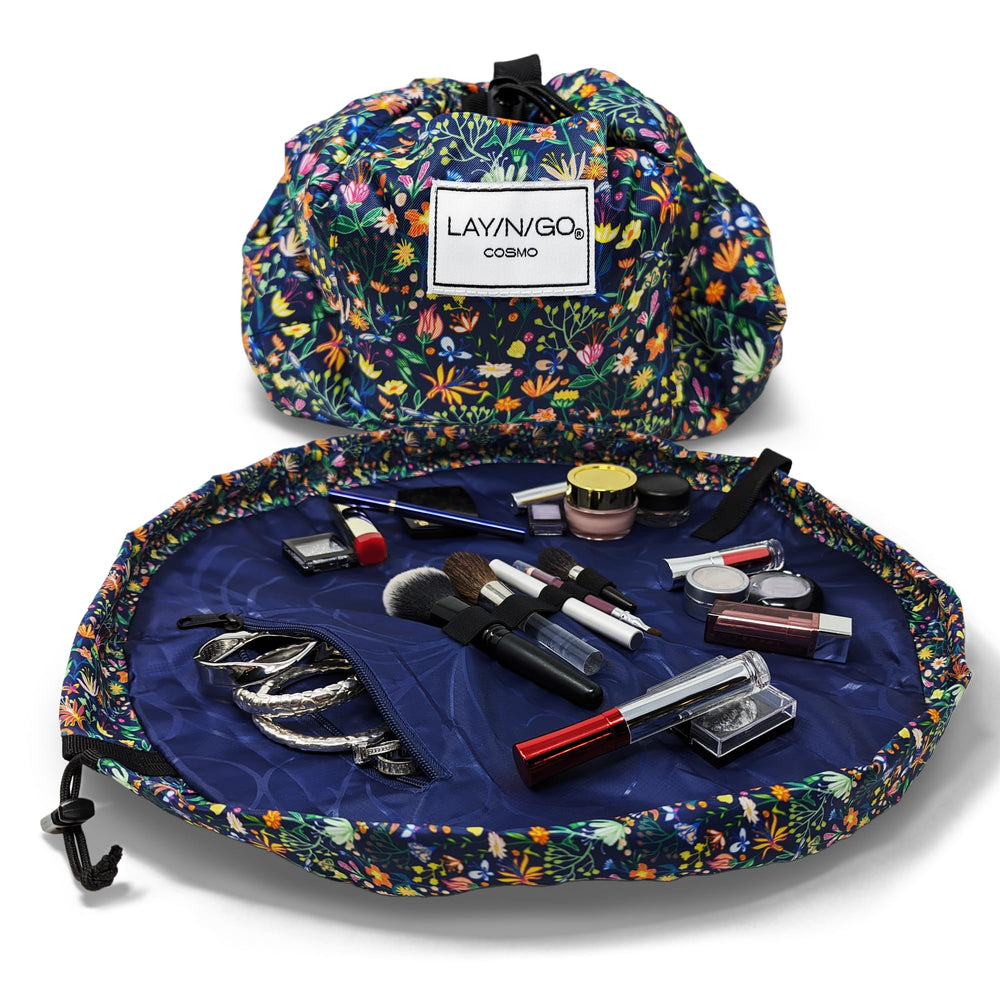 Lay-n-Go Cosmo butterfly small floral opens flat for quick makeup access during travel.