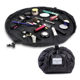 Lay-n-Go Cosmo layflat drawstring bag for portable makeup organization on travel days.