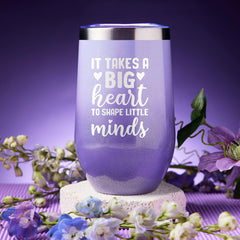 LE CADEAU lavender candle closeup highlights soothing scent for relaxation after class.